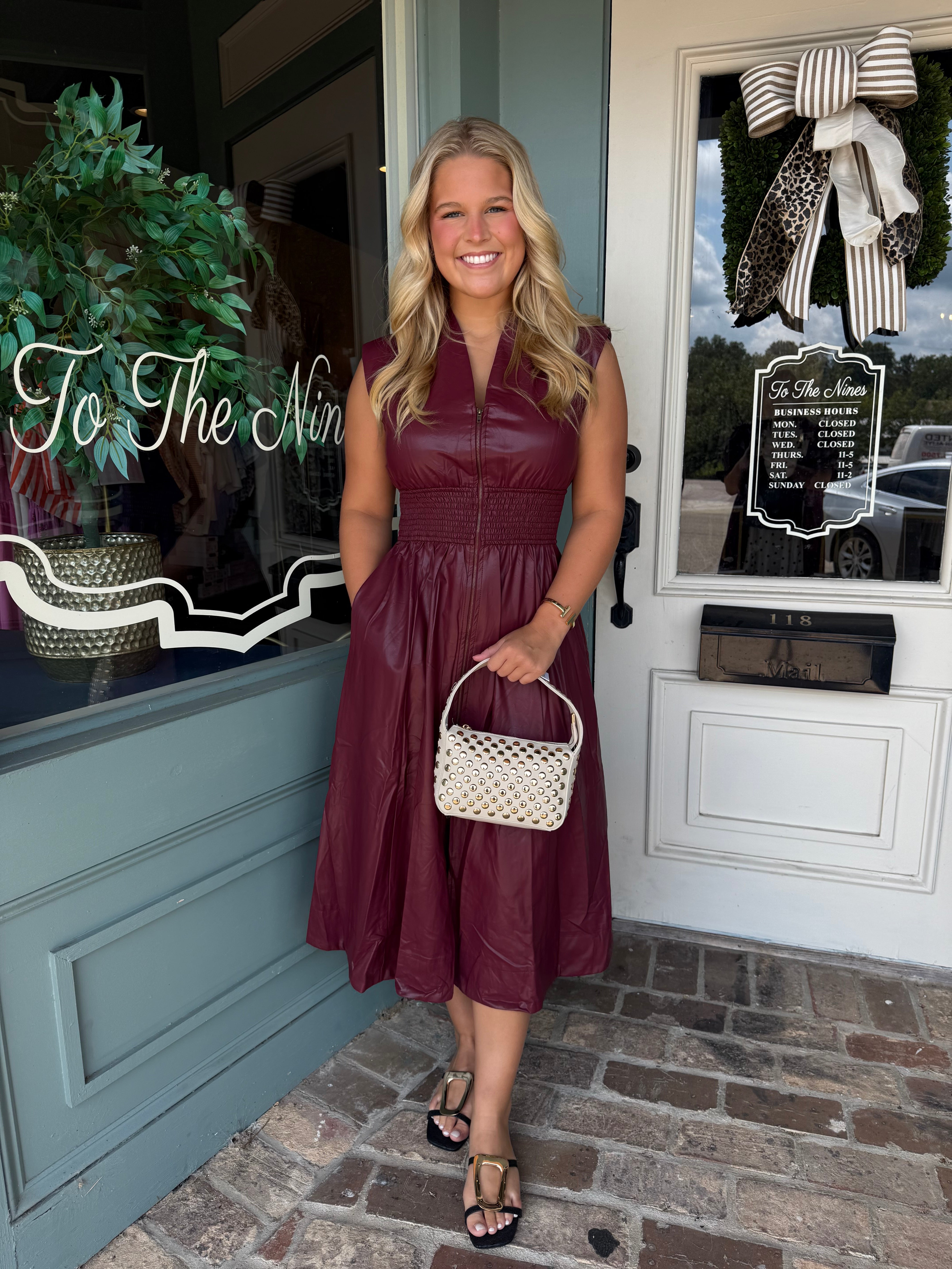 Mae Faux Leather V Neck Zip Front Midi Dress with Cinched Waist- Burgu To The Nines Mae Faux Leather V Neck Zip Front Midi Dress with Cinched Waist- Burgu To The Nines