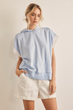 Loose fit hoodie with contrast detail at the sleeve.￼