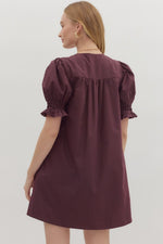 Merlot Solid short puff sleeve featuring diamond smocked band pintuck mini dress