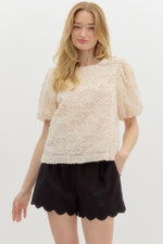 Solid Applique-Textured Bubble Sleeve Featuring Contrast Accent Bow Tie Closure at Back.