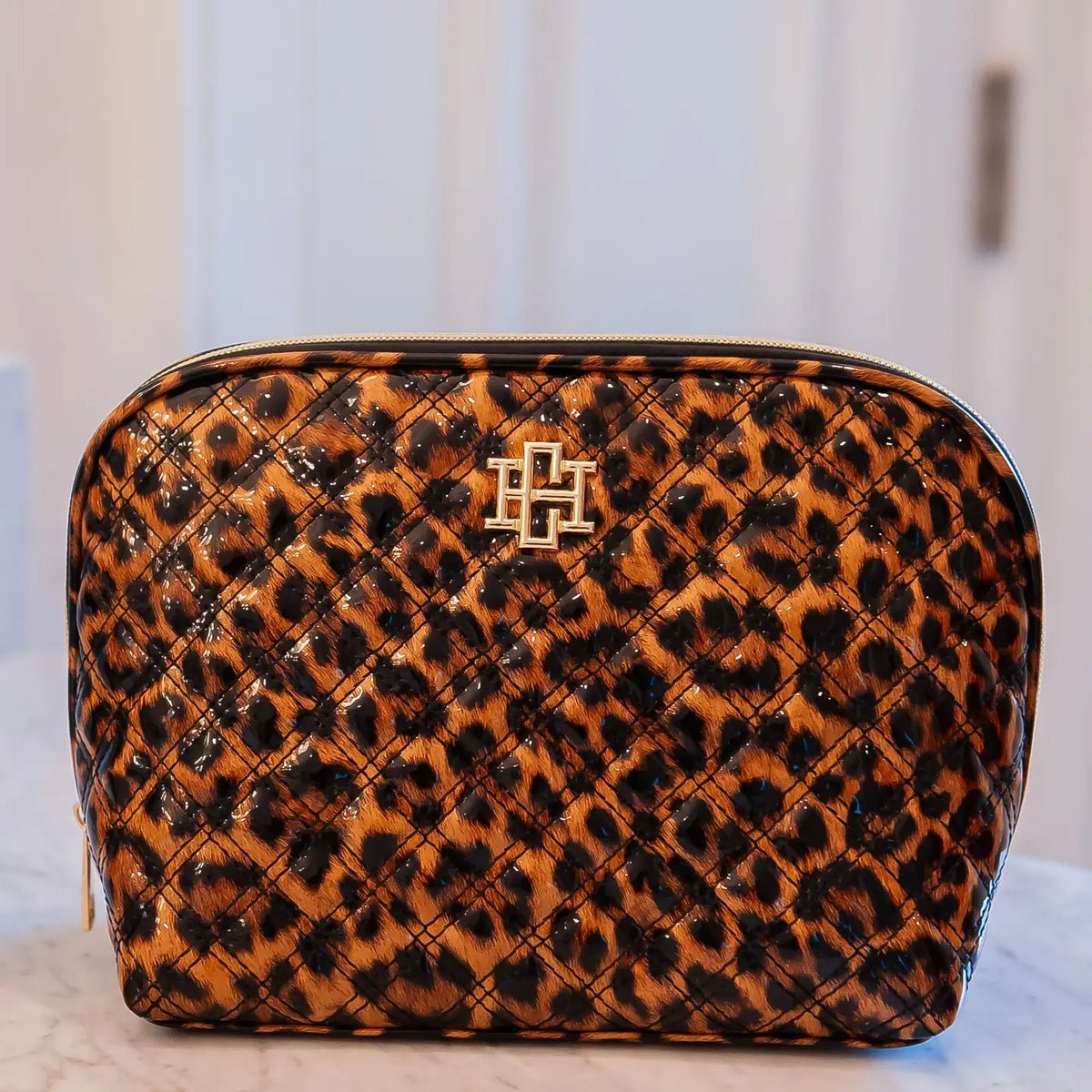 Ibiza Small Pouch Spotted Patent by Caroline Hill