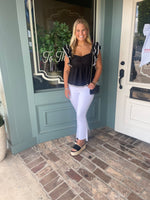 Black Peplum Ruffle Shoulder Top with White Trim