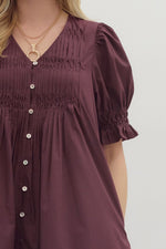 Merlot Solid short puff sleeve featuring diamond smocked band pintuck mini dress