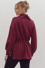 Solid Long Sleeve Tunic featuring Funnel Neck Adjustable Toggle Waist. Side slit at hem.