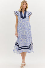 Set Sail Floral print flutter sleeve pullover midi dress featuring contrast accented caftan-inspired high neck band collar.