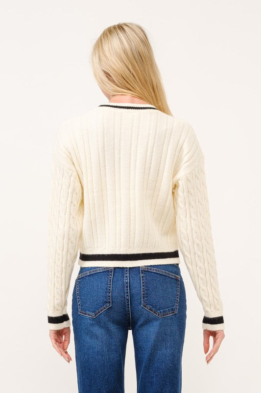 CROPPED CABLE KNIT CREW NECK WITH CONTRAST PIPING