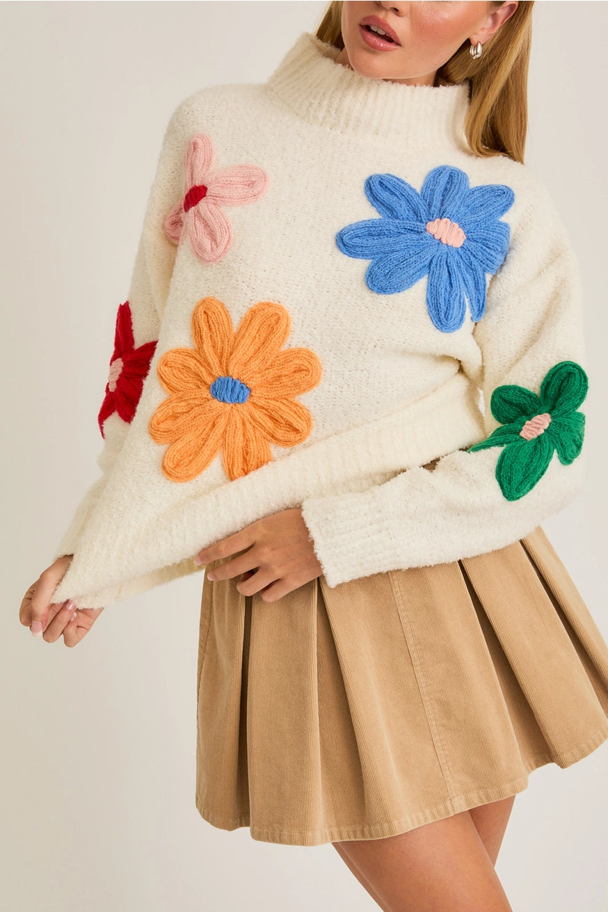 MOCK NECK FLORAL APPLIQUÉ SWEATER