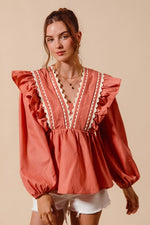 Coral WOVEN LONG SLEEVE TOP WITH WAVE TRIM