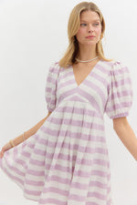Lavender Stripe pattern short puff sleeve pleated pullover mini dress. Elasticated back waist. Pockets at side.
