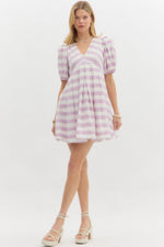 Lavender Stripe pattern short puff sleeve pleated pullover mini dress. Elasticated back waist. Pockets at side.