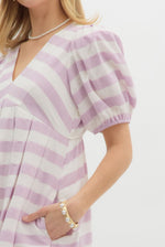 Lavender Stripe pattern short puff sleeve pleated pullover mini dress. Elasticated back waist. Pockets at side.