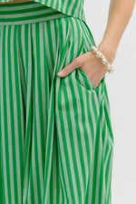 Stripe pattern sleeveless top featuring accented wooden button back closure and Stripe pattern high waist pleated midi skirt -SET